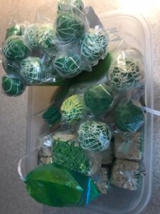 green drizzeled cake pops